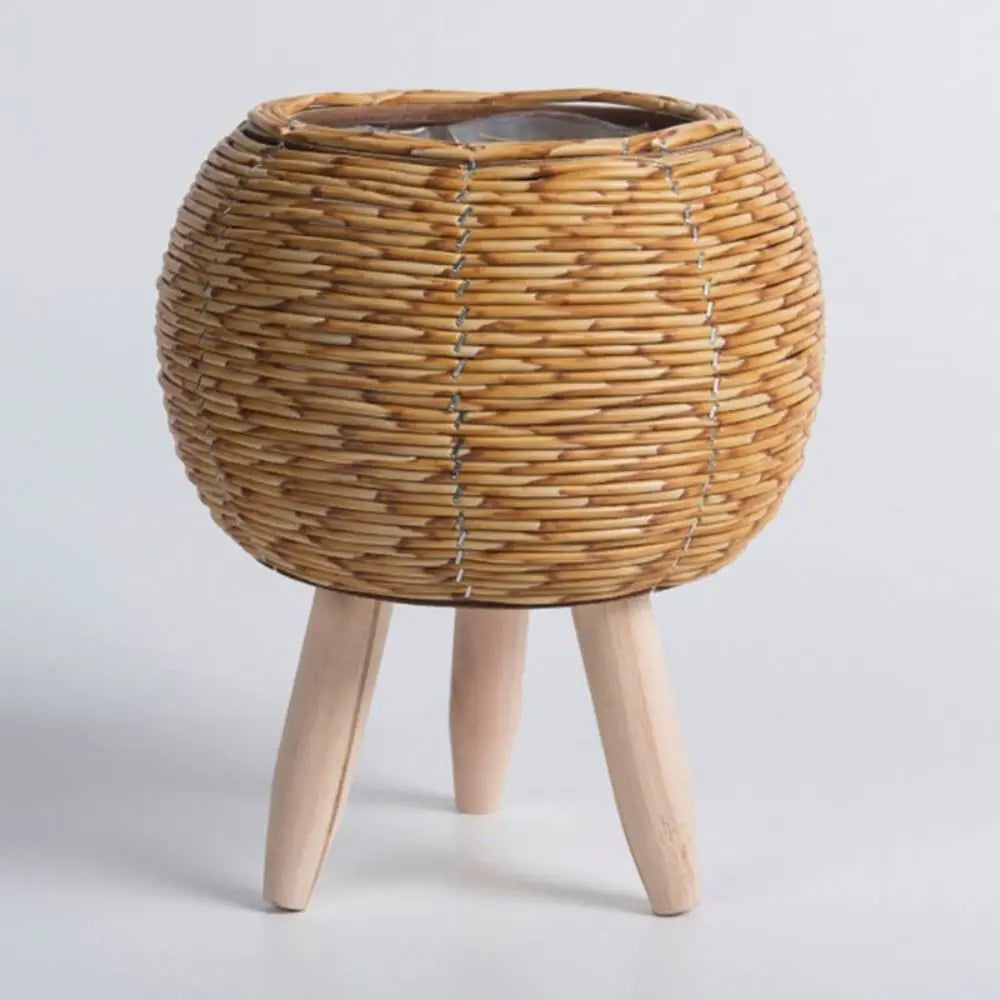 cache pot tressé rotin moderne cactus feuilles vertes marron clair pieds bois durable tissé