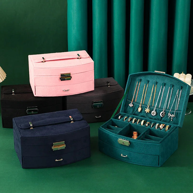 boîtes bijoux velours bleu rose noires classiques poignées métalliques rangement colliers bagues bracelets