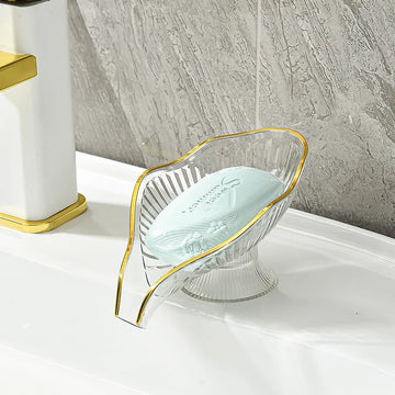 porte savon feuille transparente bord doré motif rayonné savon blanc vert orange moderne élégant