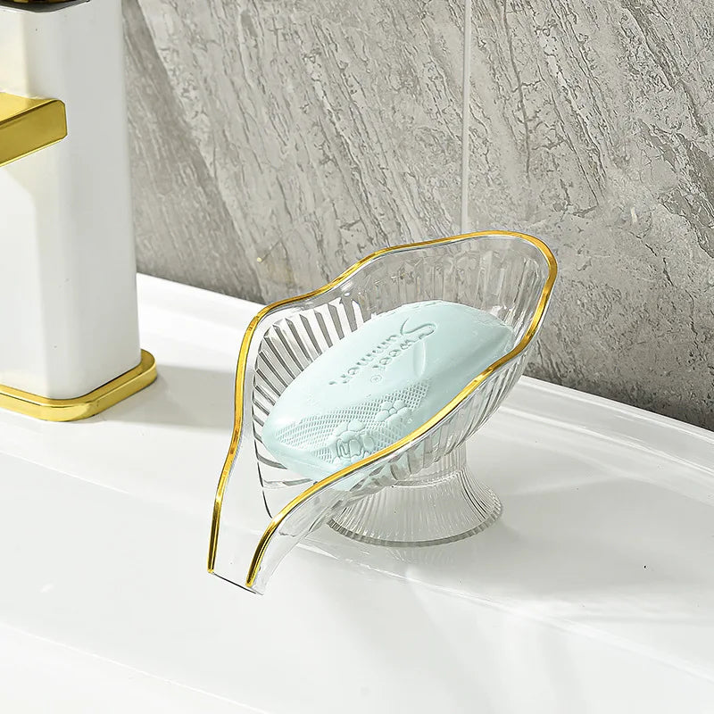 porte savon feuille transparente bord doré motif rayonné savon blanc vert orange moderne élégant