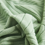 housse canapé jupe motif feuilles jacquard beige vert pastel oreillers assortis
