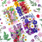 fleurs séchées composition artisanale violet bleu rose blanc vert décoration uv epoxy fills bijoux