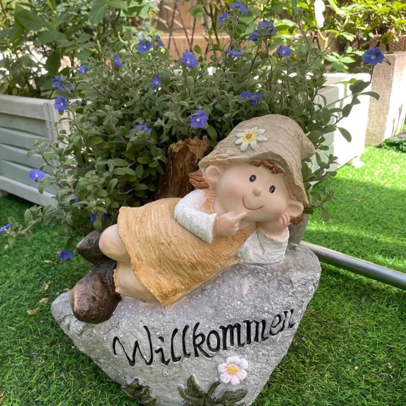 statue décorative jardin fille assise fleurs motifs floraux marron beige blanc gris vert artisanalextérieur