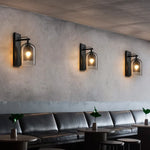 lampes murales modernes transparentes base métallique noir doré led filament