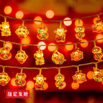 guirlande lumineuse chinoise festive lions poissons lanternes caractères rouges orange doré