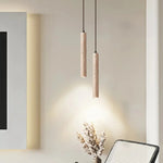 Suspension lumineuse moderne pierre marbrée beige clair foncé texture naturelle minimaliste pendentif cordon