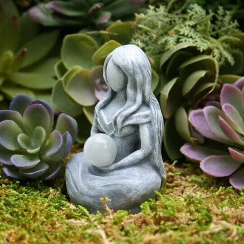 statue méditation femme sphère gris blanche pierreuse sculptée spirituelle intérieure décoration maison