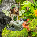 statue fée jardin vert clair trèfle ailes veinées fantaisie natureextérieurintérieurDecorationJardinFéeSculptee