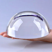 presse papier verre transparent moderne sphère réfléchissante élégant reflets argentés nuances violettesintérieur decoration loupe