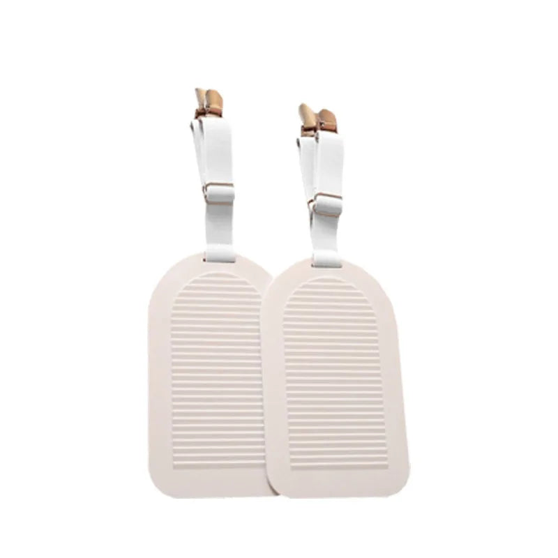 clips draps lit réglables antidérapants attaches matelas blanc gris rose pâle minimaliste utilitaire