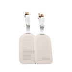 clips draps lit réglables antidérapants attaches matelas blanc gris rose pâle minimaliste utilitaire