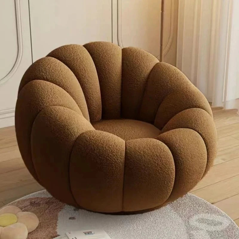 fauteuil moderne velours bouclé doux repos pieds beige clair intérieur meubles salon contemporain