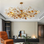 lustre cristal doré branches feuilles translucides moderne élégant suspension salon chambre luxe décoratif