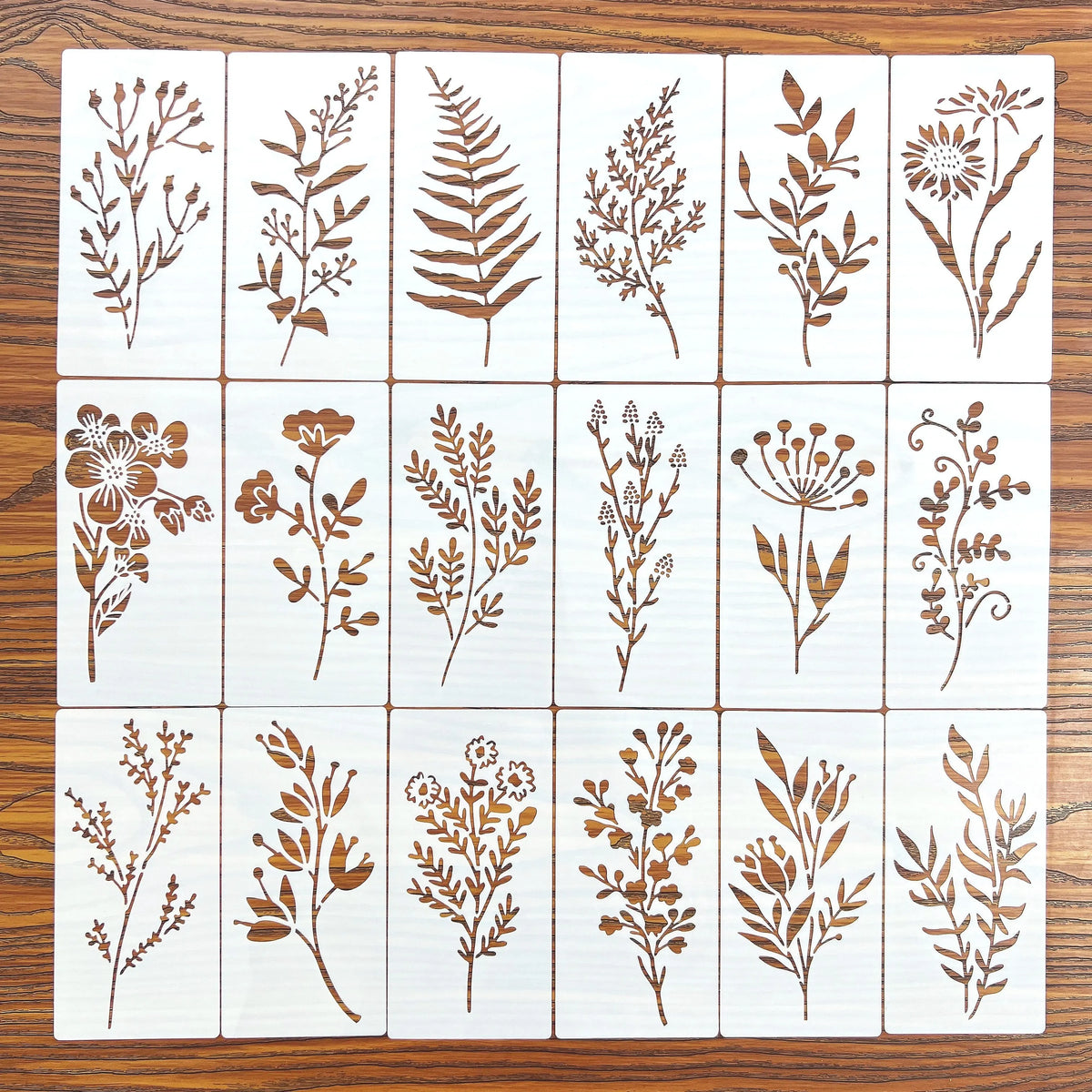 pochoirs peinture fleurs motifs végétaux feuilles branches floral rustique vintage bois tissu papier aérosol