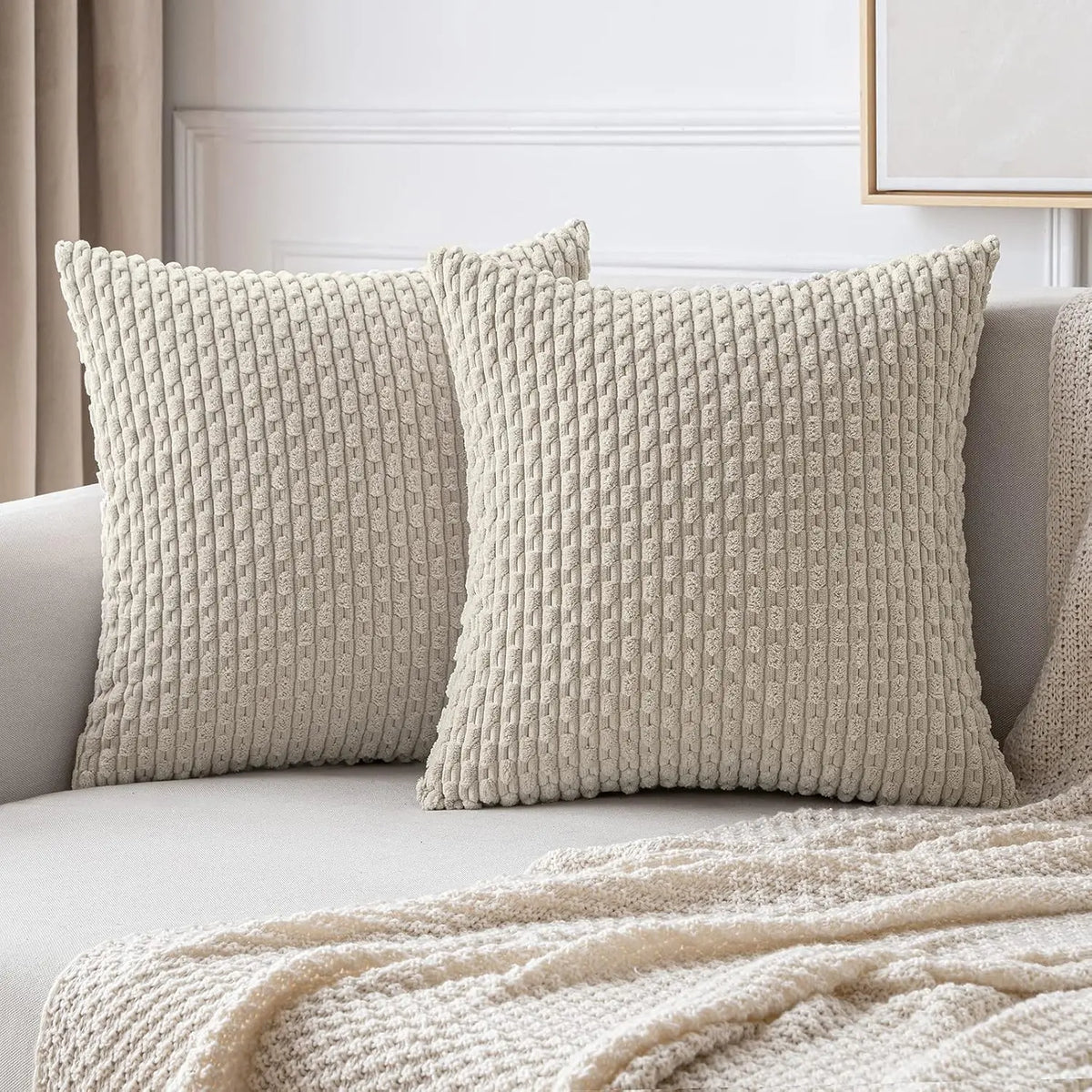 coussin carré orange texture tissée moderne garnissage blanc canapé salon décoration maison