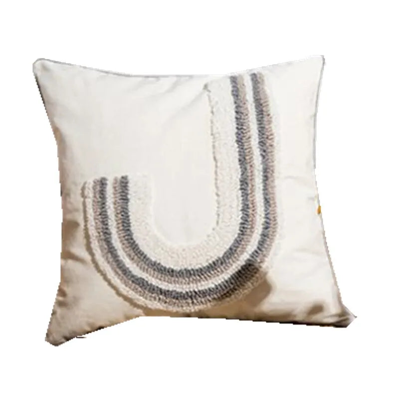 coussin carré rectangulaire beige motifs géométriques dorés pompons chambre salon déco