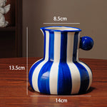 vase table céramique moderne rayé bleu rouge vert blanc noir