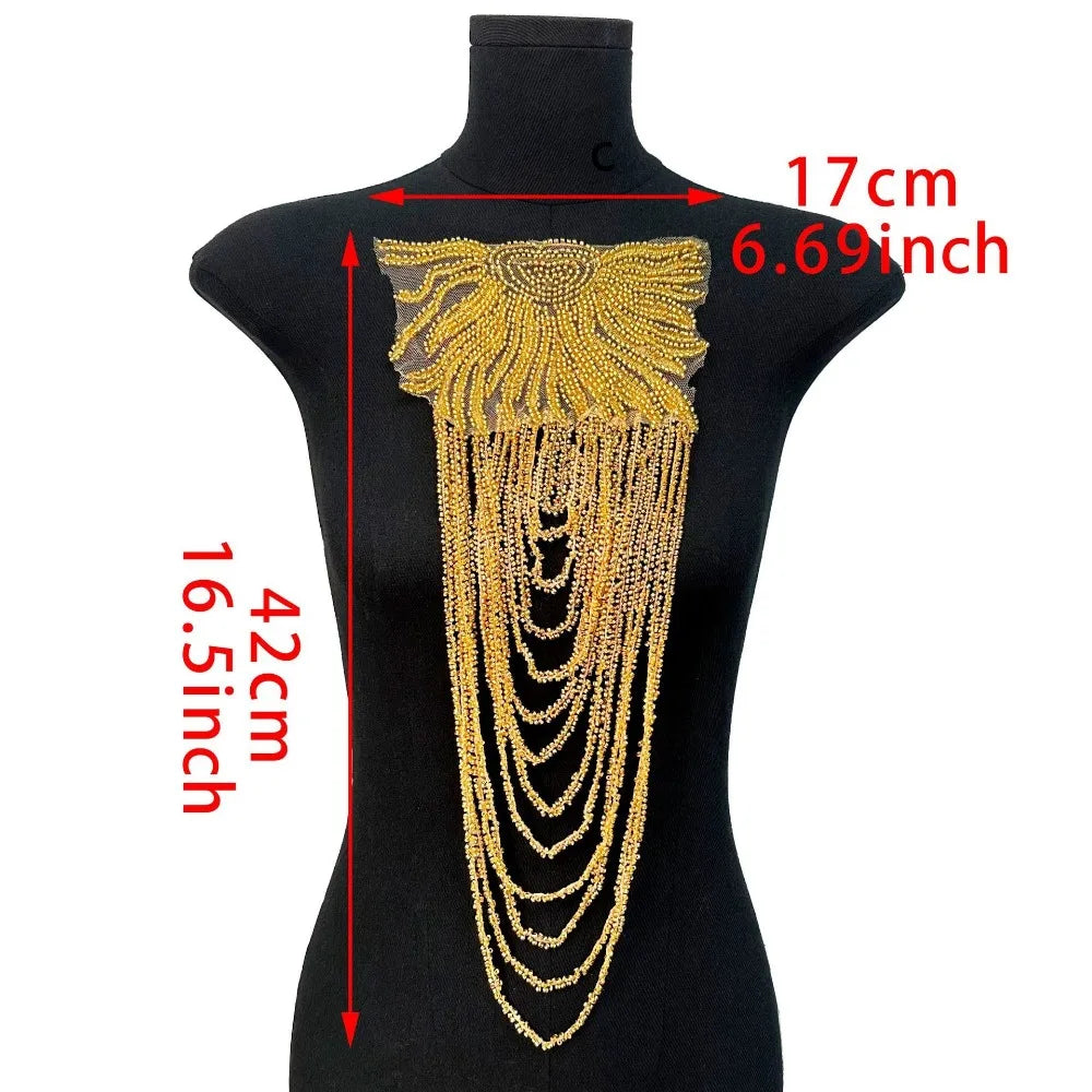accessoire textile broche franges rouge or noir élégant chic festive decoration