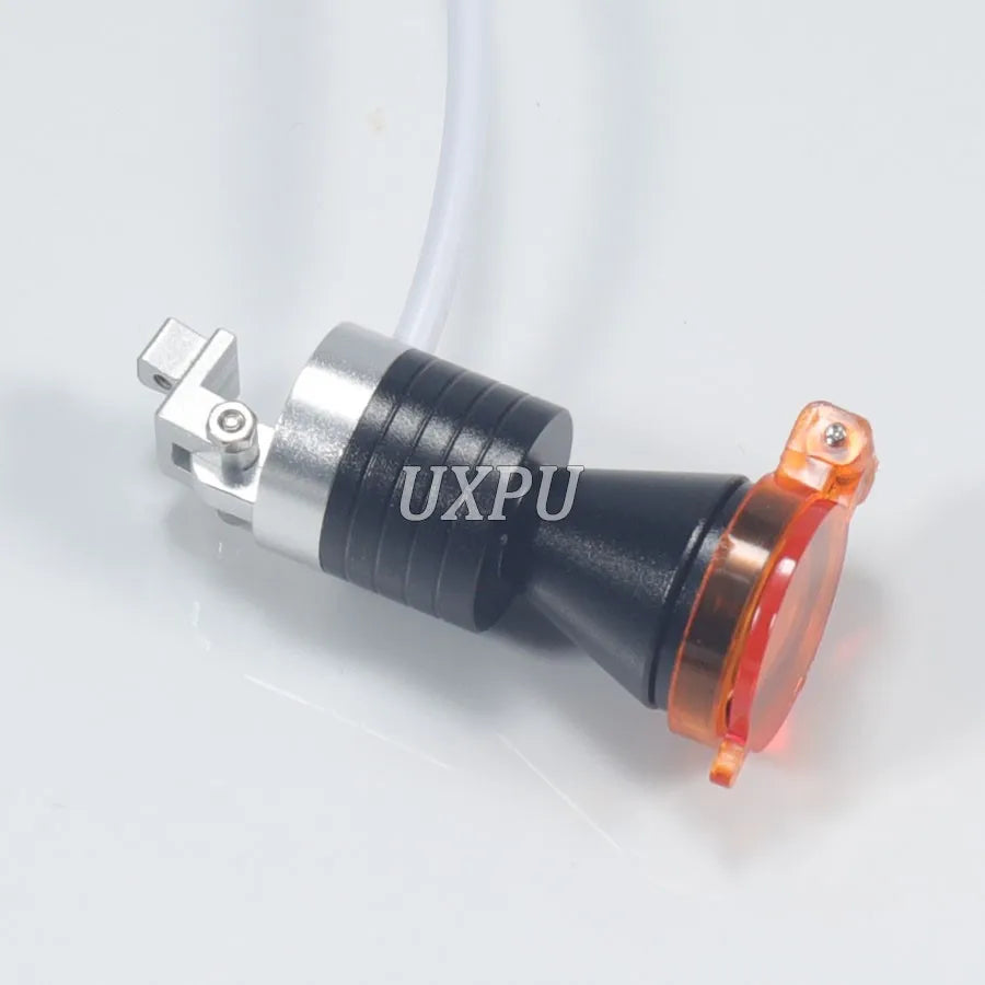 lampe frontale led argent noir moderne tête texturée lentille transparente orange fixée câble boîte