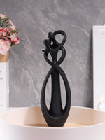 sculpture abstraite moderne couple étreinte résine beige noir gris texture granuleuse salon chambre coucher