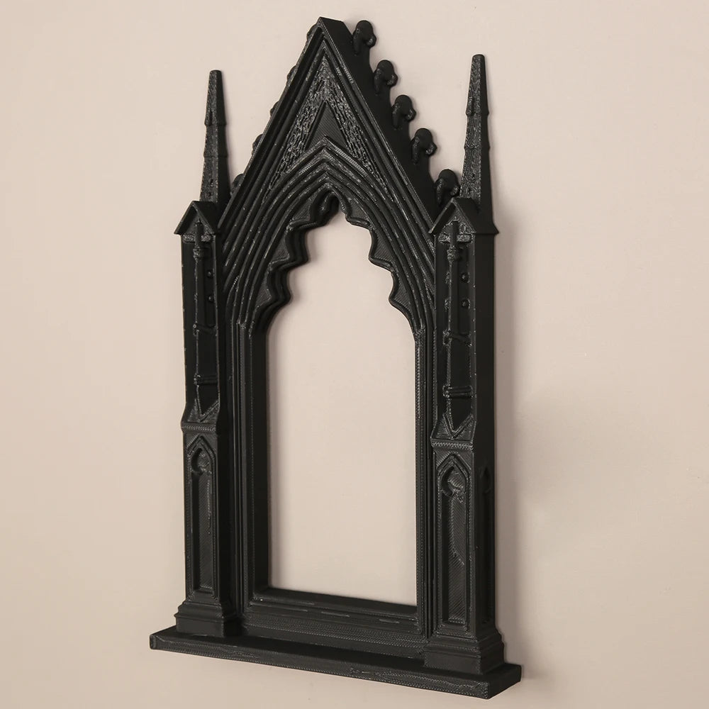 miroir gothique noir orné pointes décoration murale foncé sculpté
