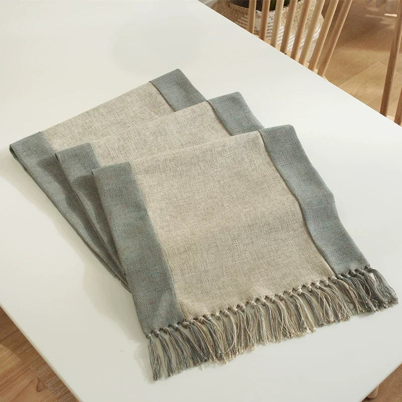 nappe tissée franges scandinave minimaliste gris beige vertebranches verte plante verte pot artwork encadré