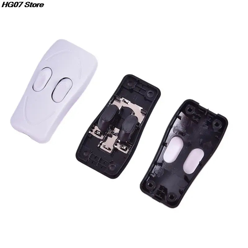 télécommande moderne blanc noir interrupteur bouton poussoir vis fixations rondes lisses