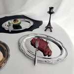 assiettes ovales argentées motifs floraux classiques dessert fruits organisateur table manger