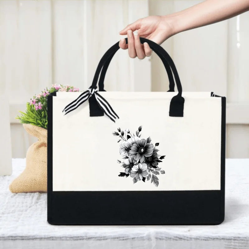 sac main toile fleurs noires fond beige moderne élégant poignées détachables zip intérieur respectueux