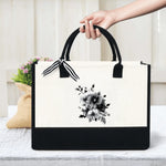 sac main toile fleurs noires fond beige moderne élégant poignées détachables zip intérieur respectueux