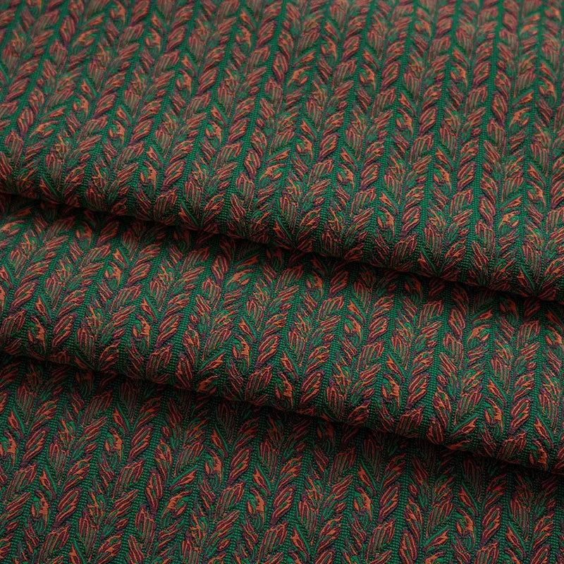 tissu polyester jacquard motif feuilles vert foncé rouge rustique épais texturé plié bricolage automne