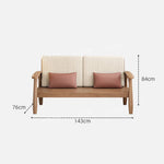 canapé places scandinave beige clair fauteuil pied poule moderne tapis géométrique terracotta blanc