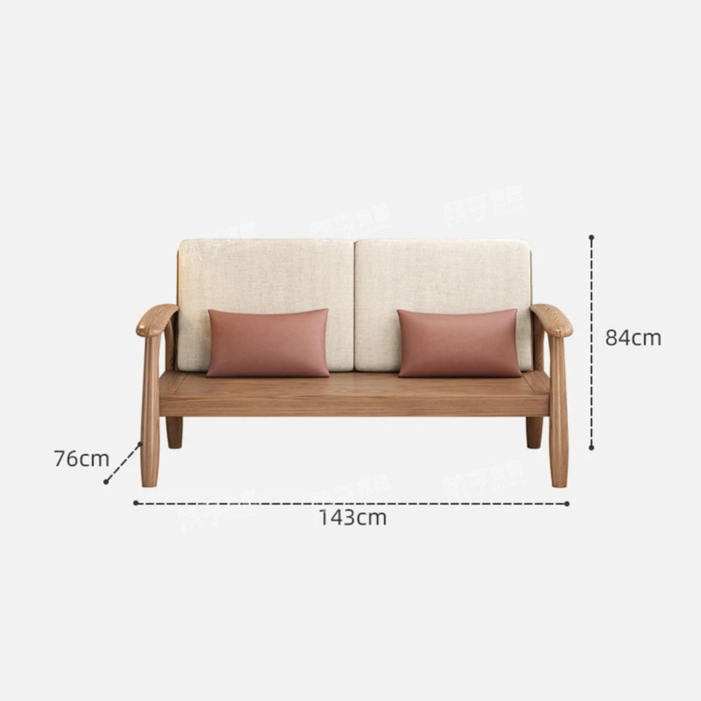 canapé places scandinave beige clair fauteuil pied poule moderne tapis géométrique terracotta blanc