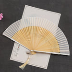éventail pliant traditionnel vert foncé noir marron clair décoration mariage accessoire fête parfumé chinois