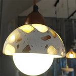 Suspension lumineuse moderne pierre texture granulée blanc marron beige gris câble suspendu chambre salon
