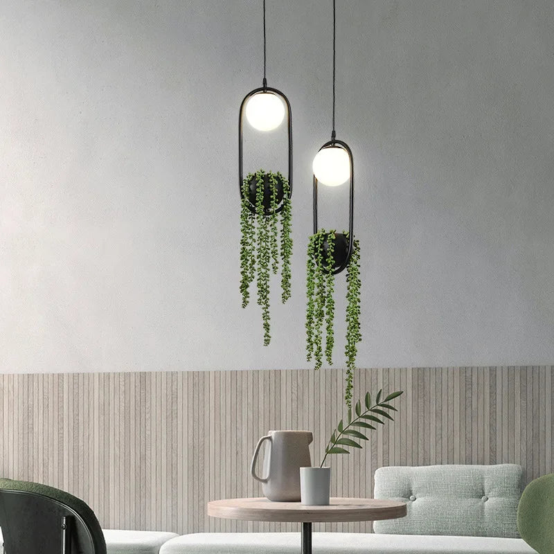 suspension végétale moderne plante artificielle lumière sphère lumineuse noir blanc vert minimaliste