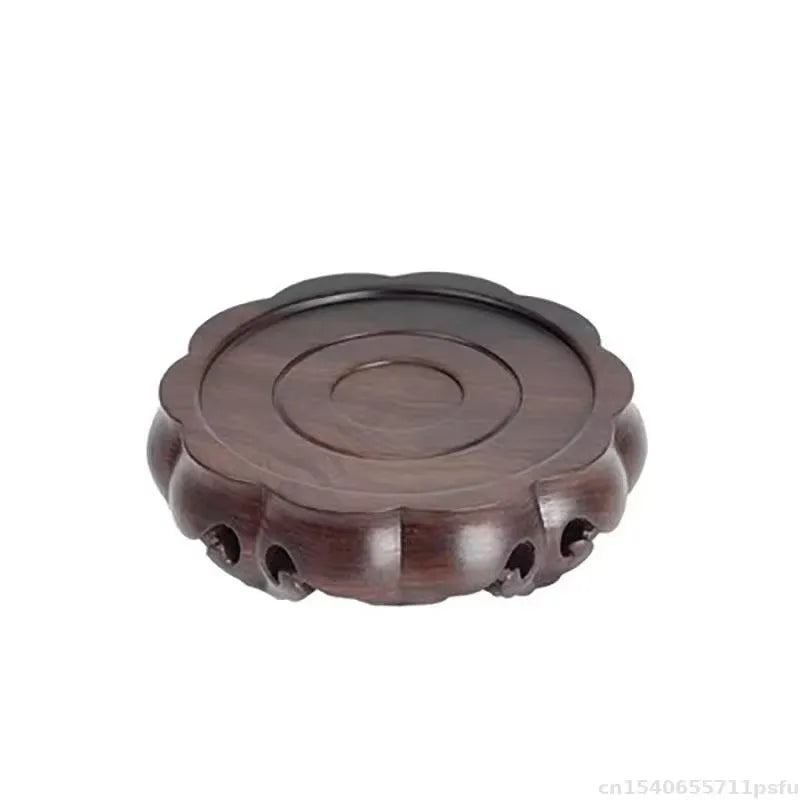 support décoration bois marron foncé texture naturelle gravure circulaire classique artisanal théière vase boule