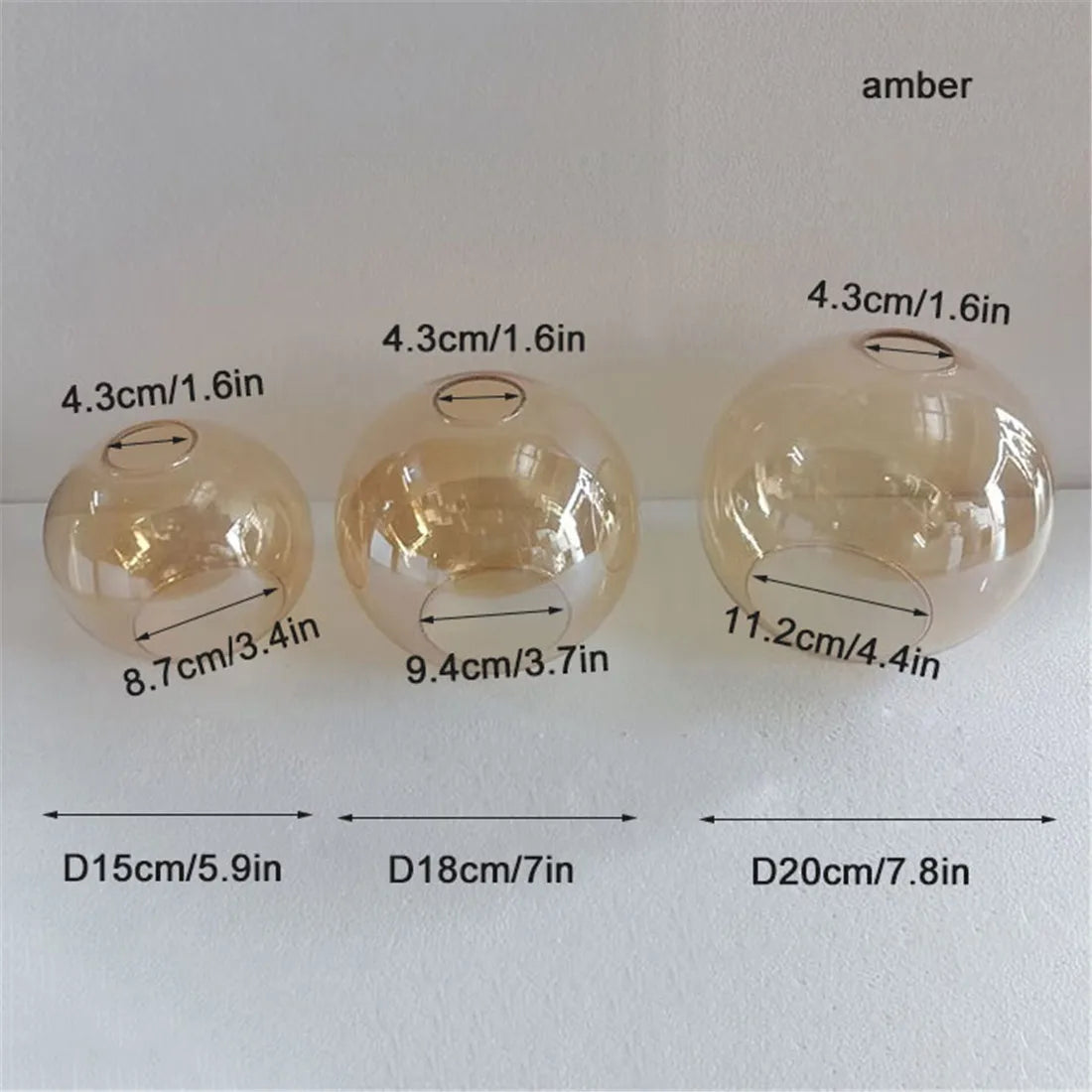 suspension boule verre moderne transparent ambre gris cognac diverse tailles