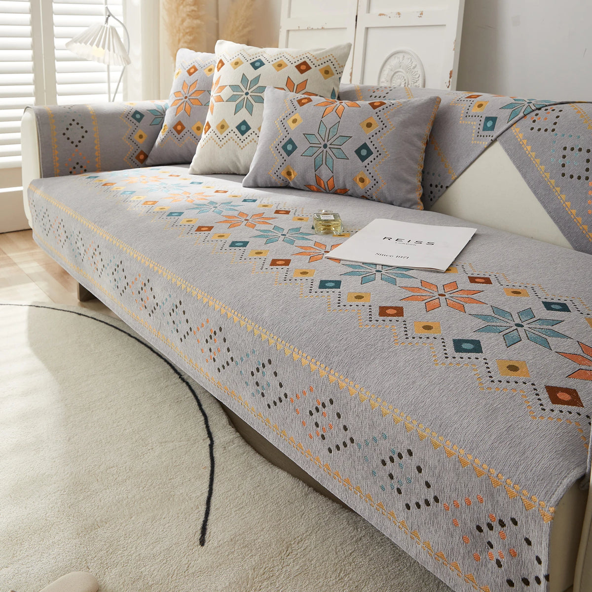 Housse canapé moderne ethnique bleu triangle motif coussins assortis polyester chenille machine lavable
