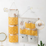 sac rangement mural multiple poches clips magnétiques beige jaune organisation moderne poches utilitaires porte