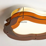 lampe contemporaine organique marron doré blanc fixée vis