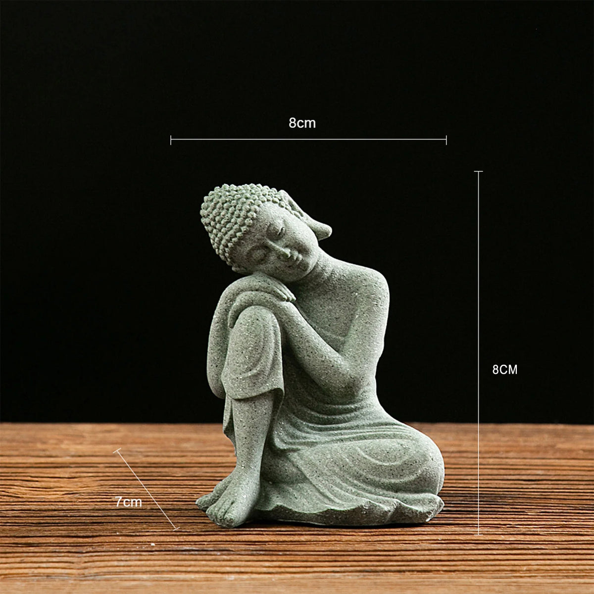 statues bouddha pierre zen minimaliste figurines assises accroupies table bois