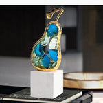 sculpture moderne or fruit marbre transparent poire pomme décoration intérieure contemporain