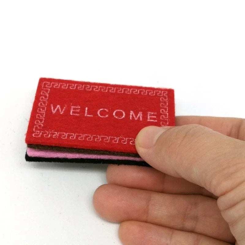 tapis bienvenue rouge rose noir marron motif géométrique moderne adhésif inclusion tapis