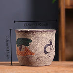 cache pot céramique artisanal méditerranéen couleurs vives motifs texturés plante verte intérieur moderne