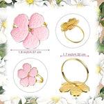 anneaux serviettes métal rose fleurs stylisées décoration table moderne élégante événement noël