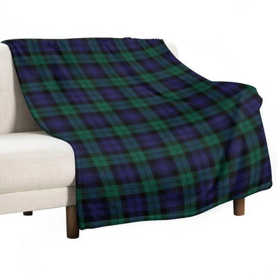 Couverture tartan moderne bleu et vert sur canapé