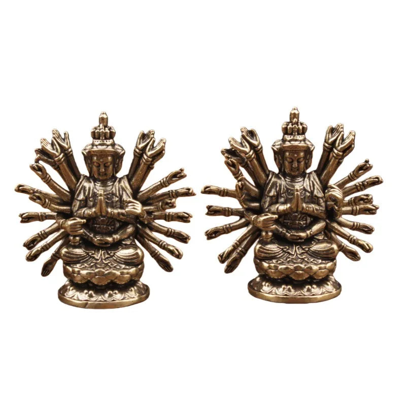 statue bouddhiste traditionnelle bronze doré détails sculptés surface lisse deux figures multiples bras