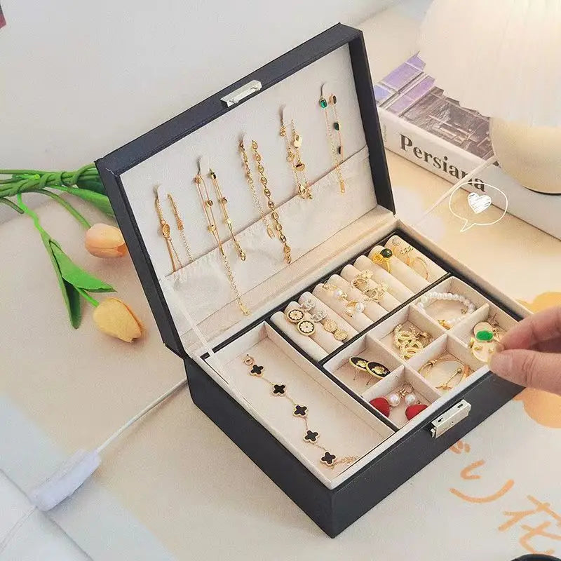 boîte bijoux simili cuir portable miroir moderne élégante poignées métalliques compartiments