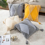 coussin brodé géométrique moderne toile coton couleur beige pompons décoratif